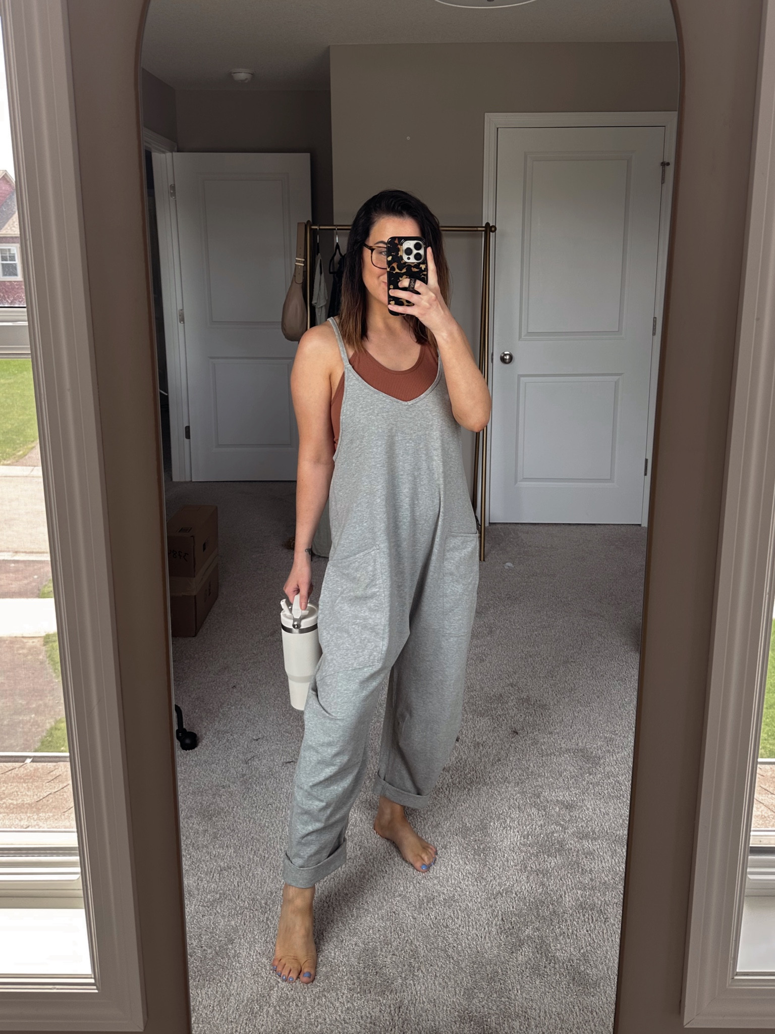 Free people onesie + amazon save version of my free people tanks! Wearing xs in onesie (amazon save version linked) & m/l in tank! Use code BRAND20 for my Stanley water bottle! 

#onesie #summeroutfit

#LTKSeasonal #LTKunder100