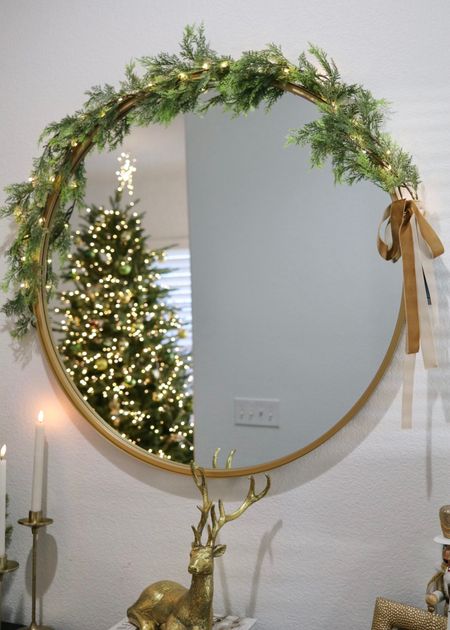 layered garlands on circle mirror, gold and warm lights Christmas decorations

#LTKfindsunder100 #LTKhome #LTKHoliday