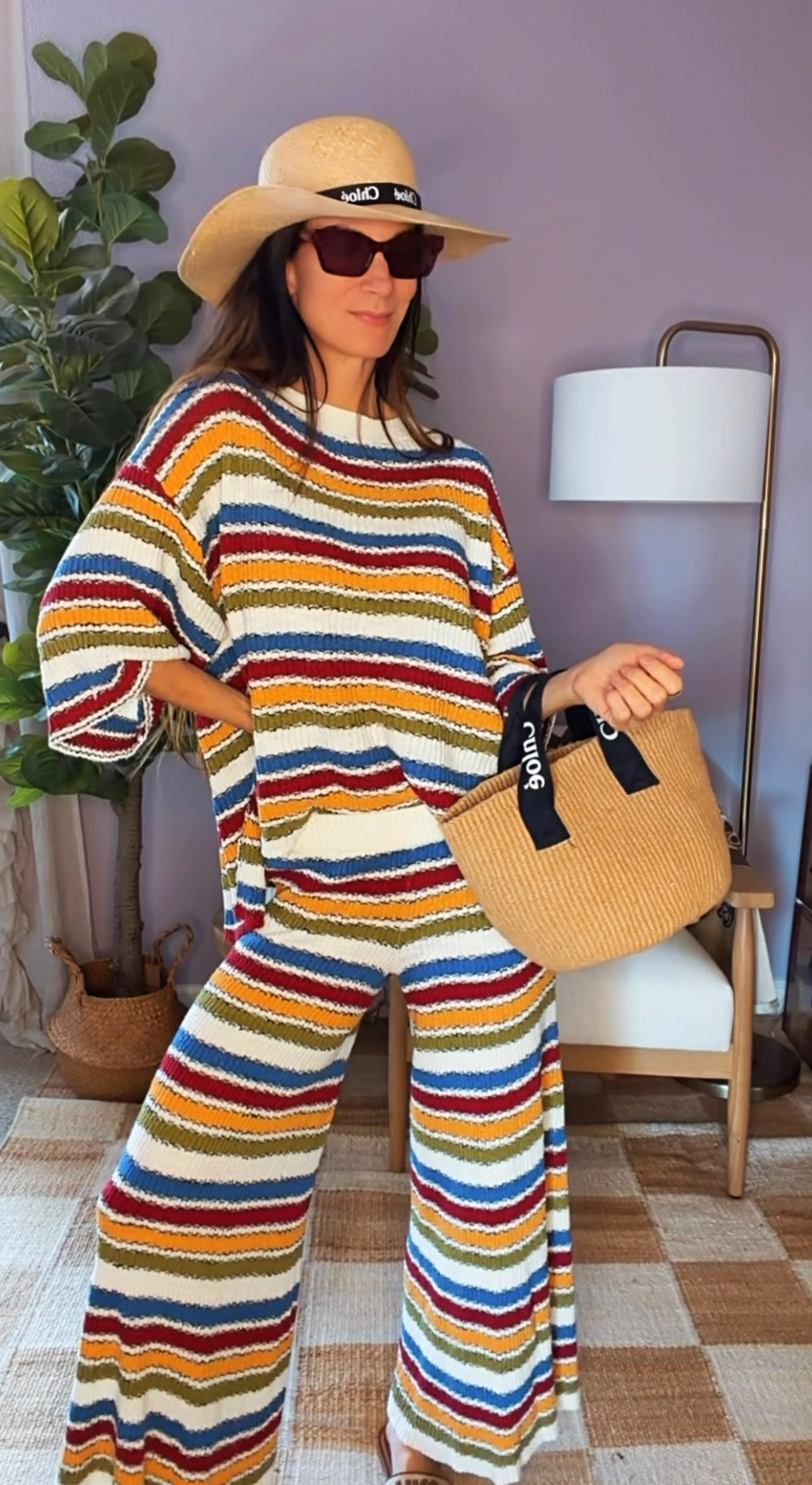 If a beach vacation and a margarita had a dress code... this would be it. 🍹☀️

I couldn't resist this colorful striped knit set. It's comfy, fun, and gives effortless resort vibes without trying too hard. Throw on a big hat, oversized sunnies, and a cute raffia bag and suddenly I'm mentally checked into a beachfront cabana somewhere.

Proof that getting dressed can be equal parts comfortable and chic. 💙❤️💛


#NicoleColeeStyle #ResortStyle #VacationOutfit #SummerStyle #MatchingSet 

 #LTKdayinmylife #LTKgrwm #LTKootd
