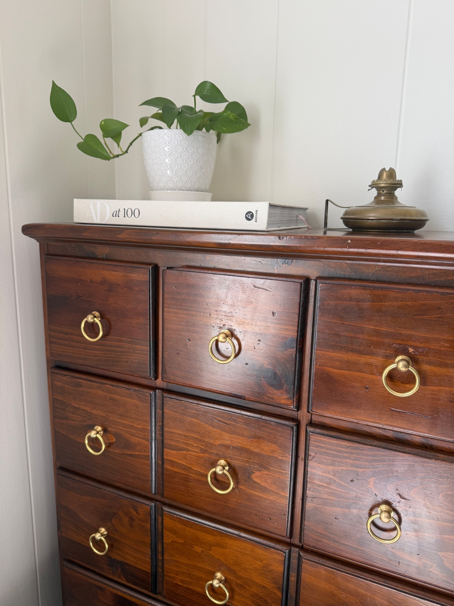 The perfect ring pulls I added to this cabinet. Finished off with a coffee table book and potted plant 🪴 #cabinethardware #drawerpulls #vintagestyle #homestyling 

#LTKHome