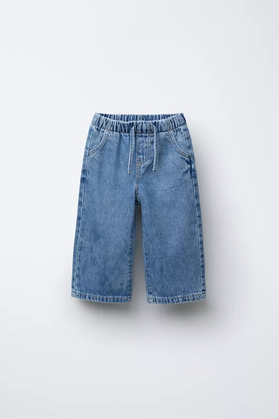 Jeans with elastic waistband and front drawstring. Front pockets and patch pockets on the back. R... | Zara US