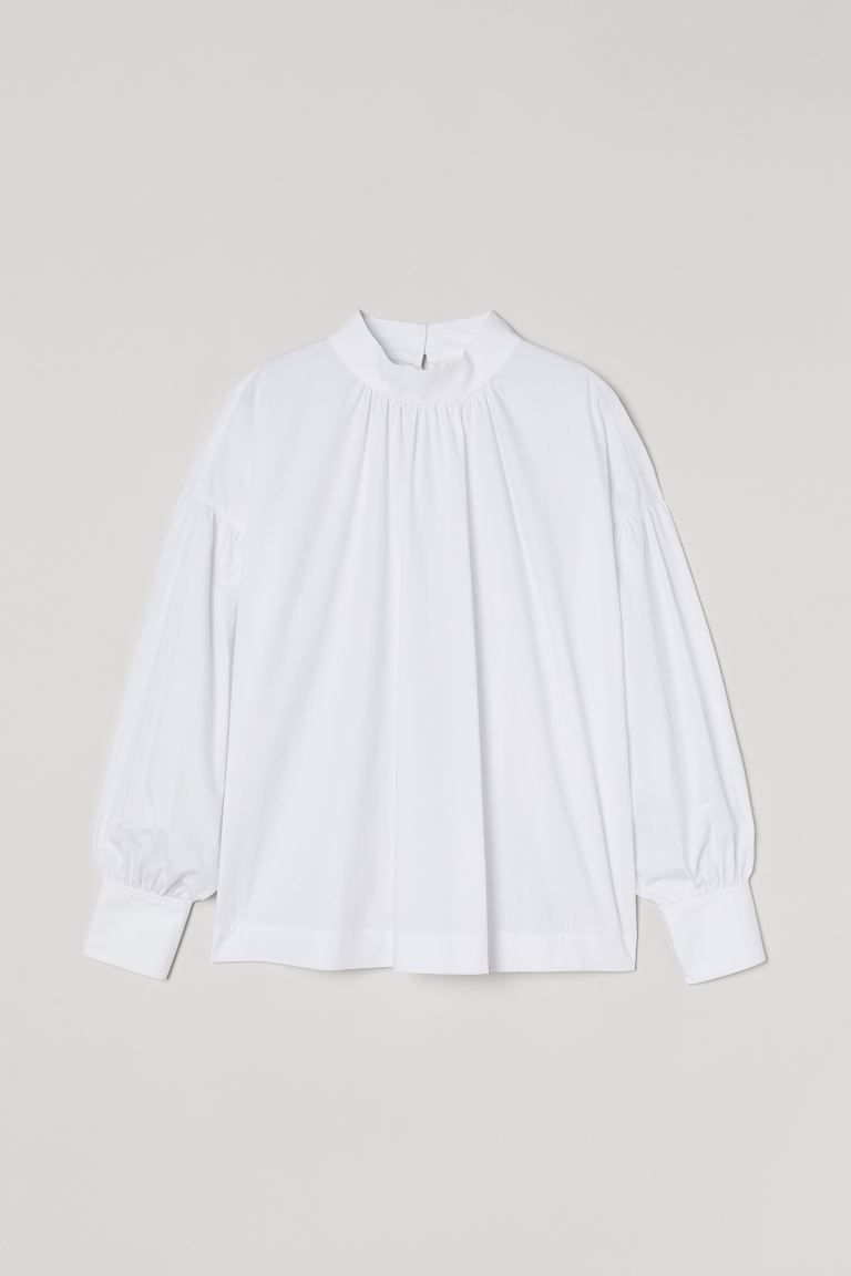 Wide-cut blouse in airy, woven cotton fabric. Double-layered stand-up collar with gathers and an ... | H&M (US + CA)