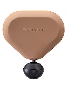 THERABODY Theragun Mini in Desert Rose from Revolve.com | Revolve Clothing (Global)