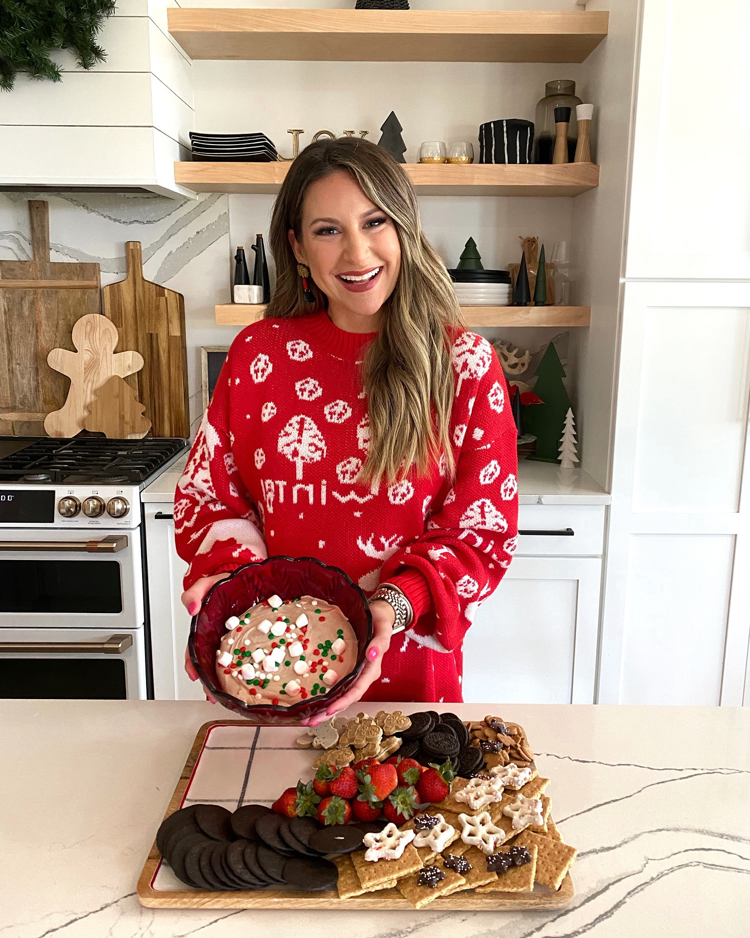 In a large Christmas/winter sweater and faux leather leggings for the holidays from Amazon- all fits TTS.

#LTKHoliday #LTKunder50 #LTKSeasonal