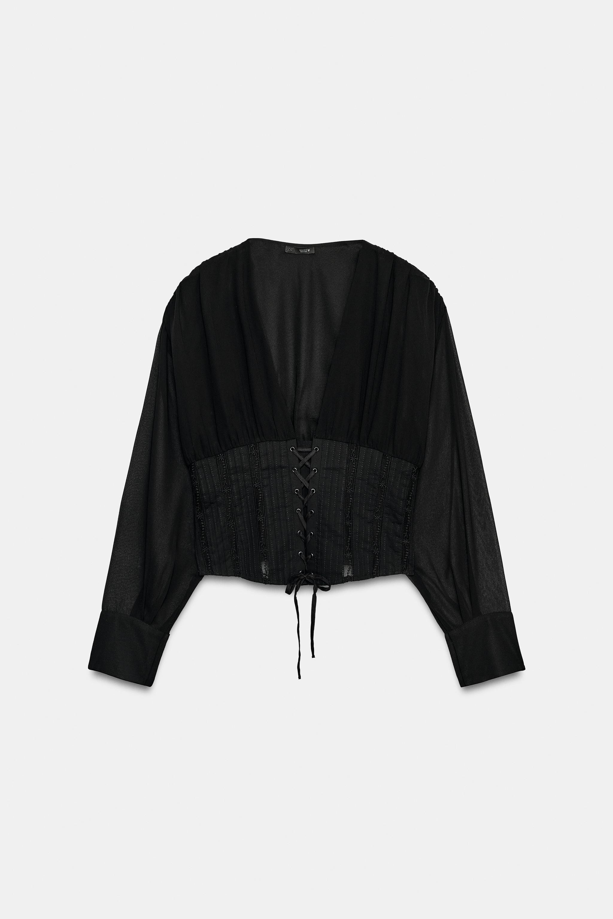 V-neck shirt with long sleeves. Features a tonal corset detail in a contrasting fabric. Side zip ... | Zara US