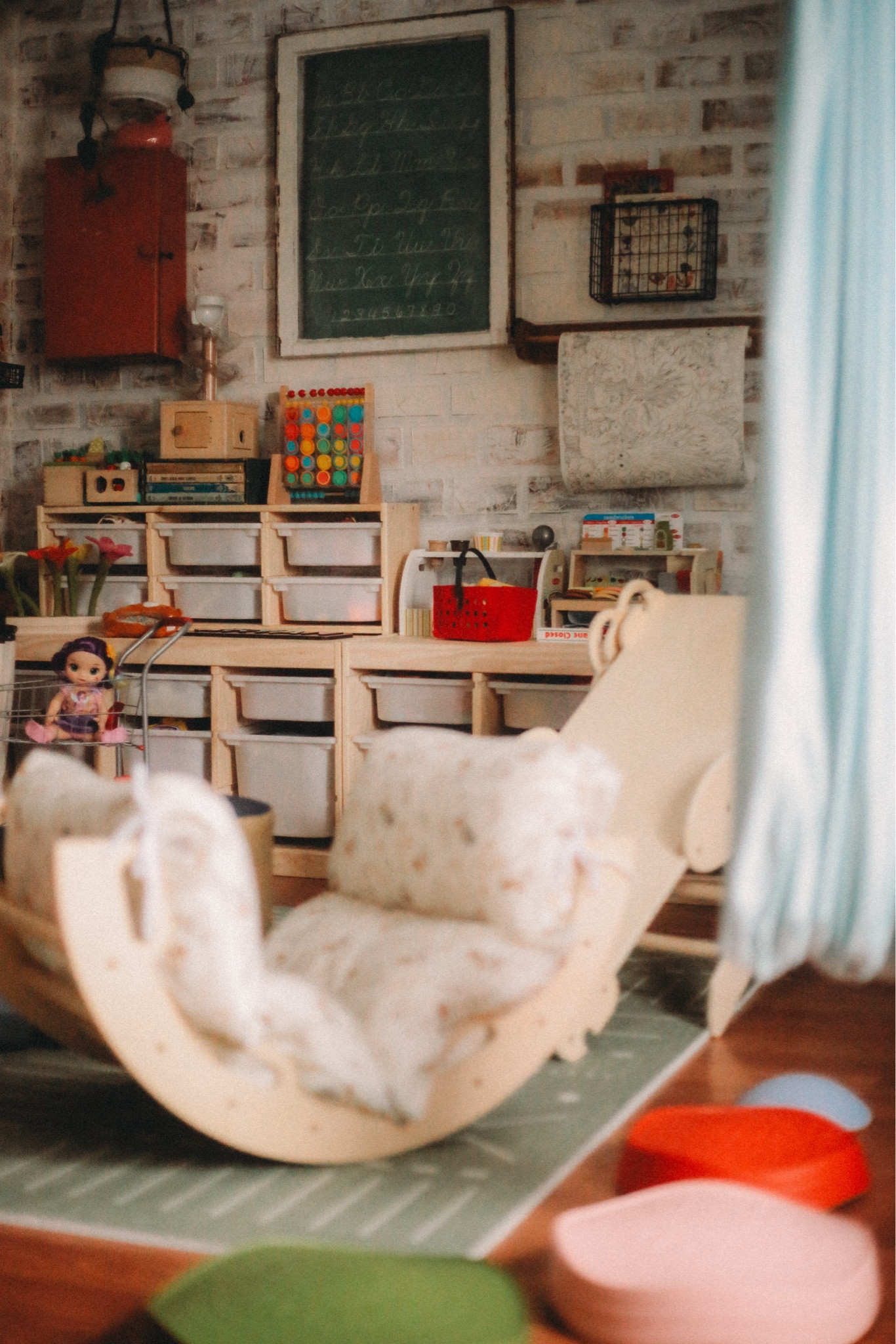 Our living room playroom where our girls spend most of their time. I’ve filled it with as many sensory and Montessori toys as possible to last them years. Everything is at their height and organized in bins for easy searching  

#LTKFamily #LTKHome #LTKKids