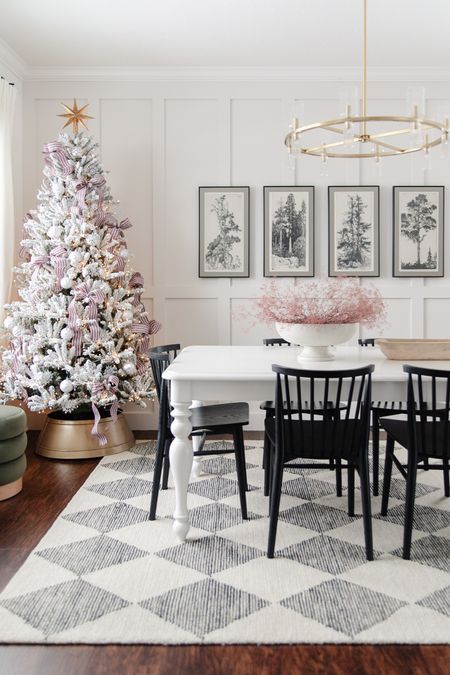 Pre lit flocked christmas tree with candy cane ribbon and silver and white ornaments, checkered loloi francis rug, white farmhouse table, christmas dining room decor#LTKCyberWeek 

#LTKhome #LTKHoliday