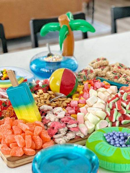 Summer themed candy/snack grazing board  I put together for. a youth group event!  Sharing some of the candy I used along with the mini pool floats that made it extra cute! 

#LTKSeasonal #LTKParties #LTKHome