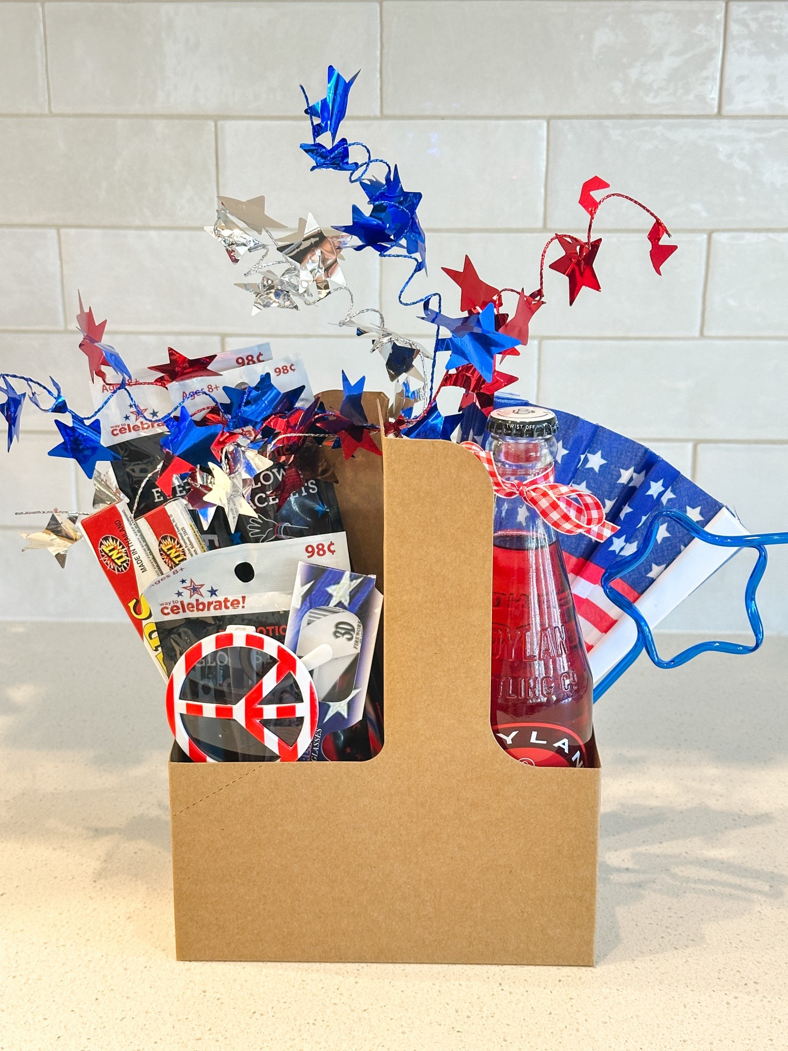 Putting together the cutest 4th of July gift boxes for my kids, and I couldn’t be more excited! These festive boxes are packed with fun and patriotic goodies to make the day extra special and memorable. Inside each Independence Day box, I included:
	•	Sparklers for a little magic in the evening
	•	Glow sticks and red, white, and blue sunglasses for nighttime fun
	•	Red, white & blue soda for a festive treat
	•	USA-themed hair accessories for my daughter
	•	Confetti poppers to start the celebration with a bang
	•	3D fireworks glasses to make the fireworks show even more exciting
These boxes are perfect for adding extra fun to your 4th of July celebration, whether it’s a kids’ parade, backyard barbecue, or a family fireworks show.

kids 4th of July gift boxes, patriotic kids gifts, festive family fun, Independence Day celebration, kids parade ideas, red white and blue party, patriotic celebration, family fireworks show, July 4th ideas, summer fun for kids

#LTKSeasonal #LTKFamily #LTKSummerEdit