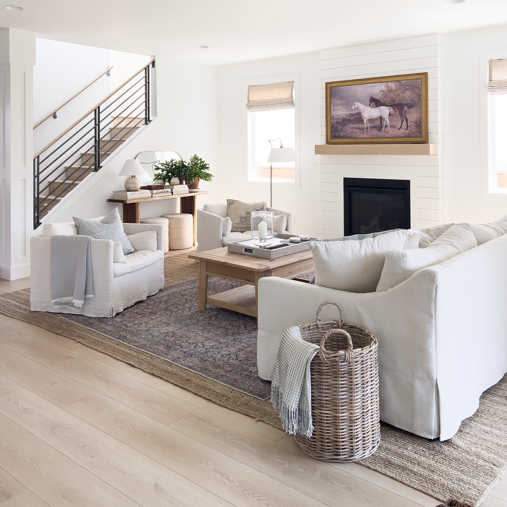 Living room decor, coastal home decor, Hamptons Nantucket French traditional cottagecore home, neutral home decor, jute rug, navy Loloi rug, jute rug, white slip covered pottery barn sofa, white couch, unique floor lamp, coffee table decor, throw blanket, Target home find, wicker storage basket, Homebyjulianne 

#LTKFind #LTKhome #LTKSeasonal