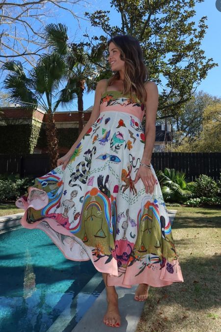 Shop Naomi Olindo's floral linen spaghetti strap midi dress perfect for a spring wedding guest outfit dress

#LTKwedding #LTKstyletip