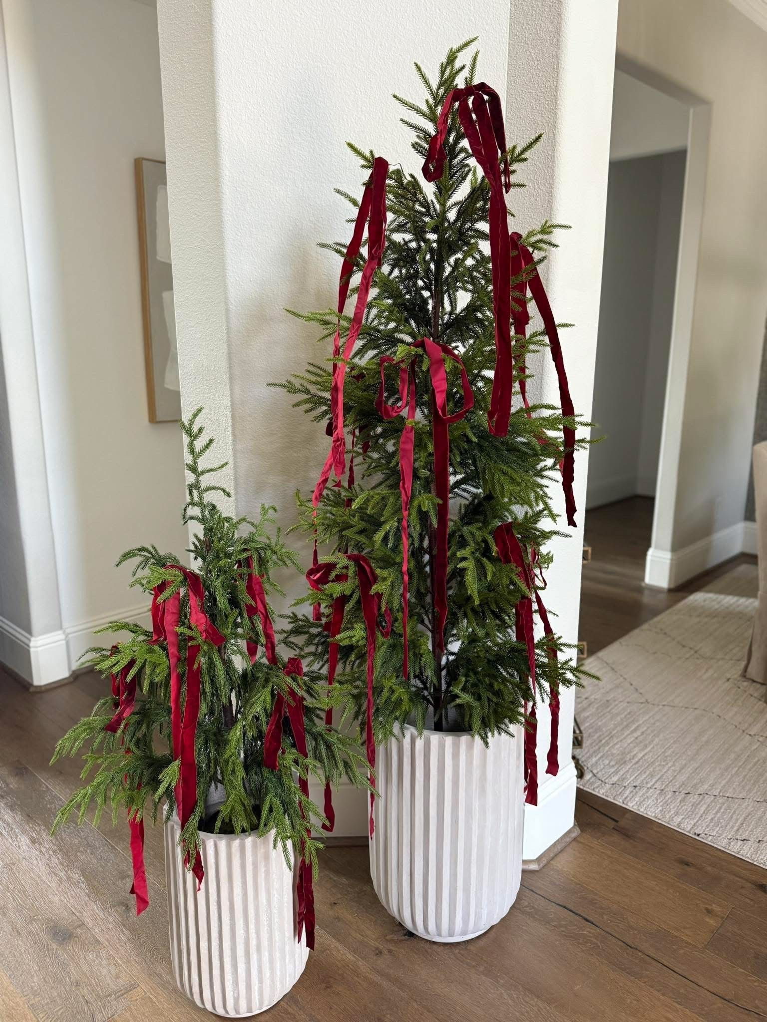 Back in stock! These trees and bows are amazing and are a fraction of the cost of the Afloral brand! The bows are premade so super easy to just throw on! 

#LTKSeasonal #LTKHome #LTKFindsUnder100