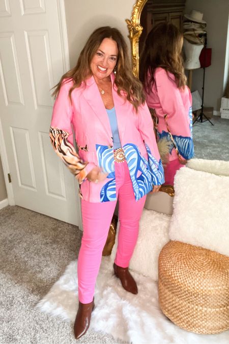 How fun is this pink graphic blazer!

I styled it with the popular Fall neon pink but it would be fabulous with a faux leather black skirt and black denim!


#LTKstyletip #LTKunder50