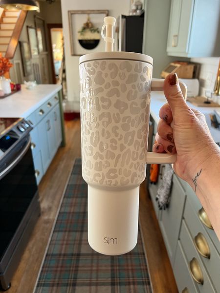 My cream leopard 🐆 Simple Modern 40oz insulated tumbler is on SALE! I love it and take it everywhere! 

I didn’t like that the straw was uncovered, so I bought these silicone spill proof straw toppers! Also works with the Stanley tumblers.

Now I have the perfect container for my water and electrolytes. 😊

This would make such a cute gift! I would put either packages of electrolytes in it or a gift card for coffee etc.

#LTKHolidaySale #LTKsalealert #LTKGiftGuide