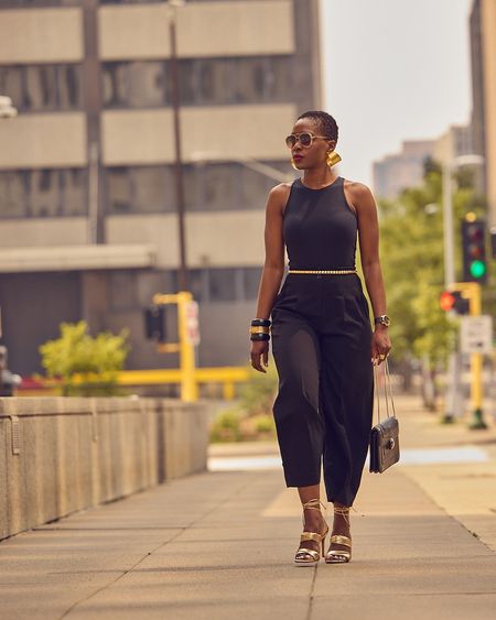Black and gold make a killer combo! Loaded up on gold accessories to jazz up a monochrome bodysuit + pants outfit. Shop these picks to recreate the look! All black outfit, strappy sandals, sleeveless outfit, Spring style, SS24, elevated casual

#LTKstyletip #LTKover40 #LTKmidsize