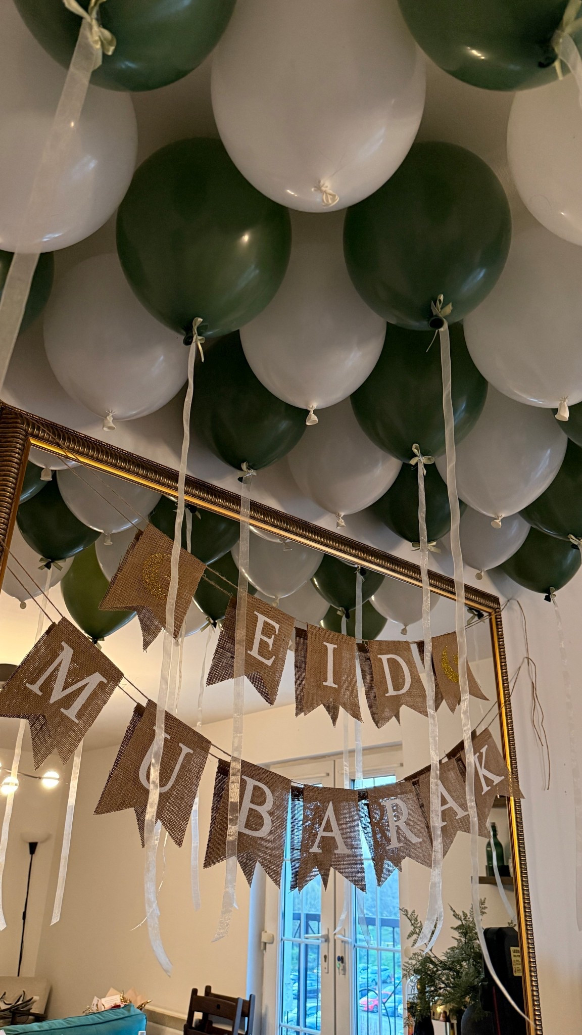 Last-minute Eid set up but we made it work 🤍✨

Alternated between green & white balloons and added a little banner to the mirror — all stuck up with masking tape (quick, easy, and super budget-friendly 🙌🏽). Didn’t have time to plan this year so this was very much a “do it fast and hope for the best” moment 😅

Ordered sage balloons but they came out very green… oops, we move 💚

Also — get yourself a balloon pump. It will genuinely save your life, thank me later 🤭🎈

Simple, cute, and done in no time ✨

#decor #styletip #homedecor #homestyling #decorsetup #balloonarch 

#LTKgiftguide #LTKstyletip #LTKuk
