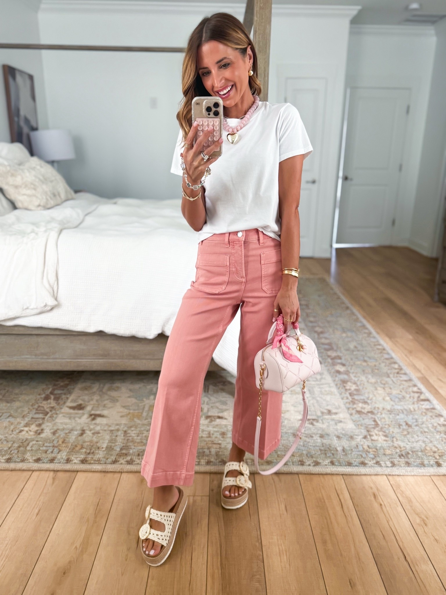 My spring outfit of the day. Summer outfit. Elevated casual. Mom outfit. I love this Spanx wide leg latch pocket jeans! Medium compression. Code LISAMARIEXSPANX on first time orders. Wearing XS petite. Could size down if in-between sizes. XS in cotton t-shirt. Beaded heart necklace. Target buckle slide sandals.

#LTKootd #LTKgrwm #LTKPetite