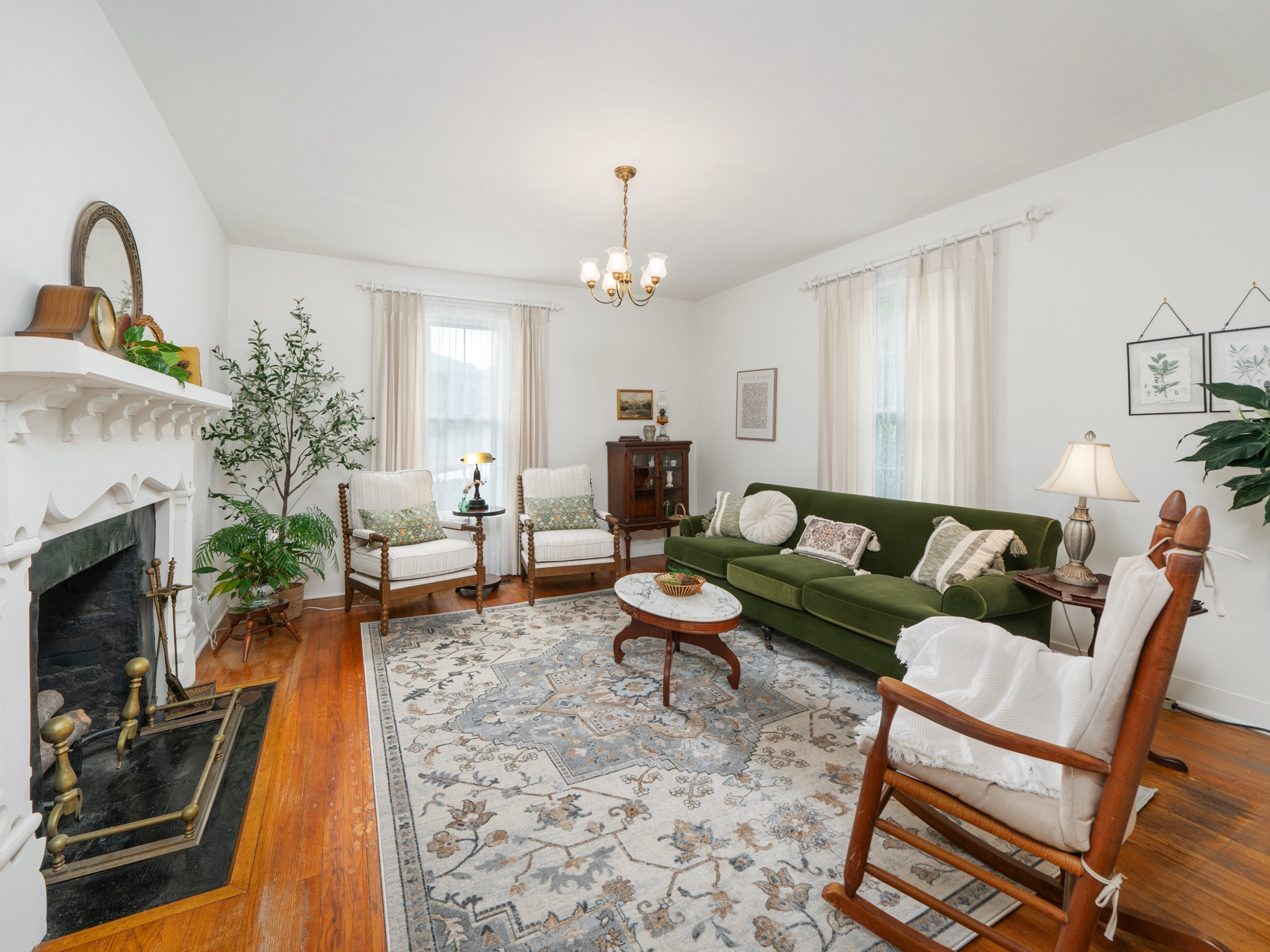 Victorian Farmhouse living room.  The velvet sofa is so dreamy and the detail on the accent seating is so good!

#LTKHome