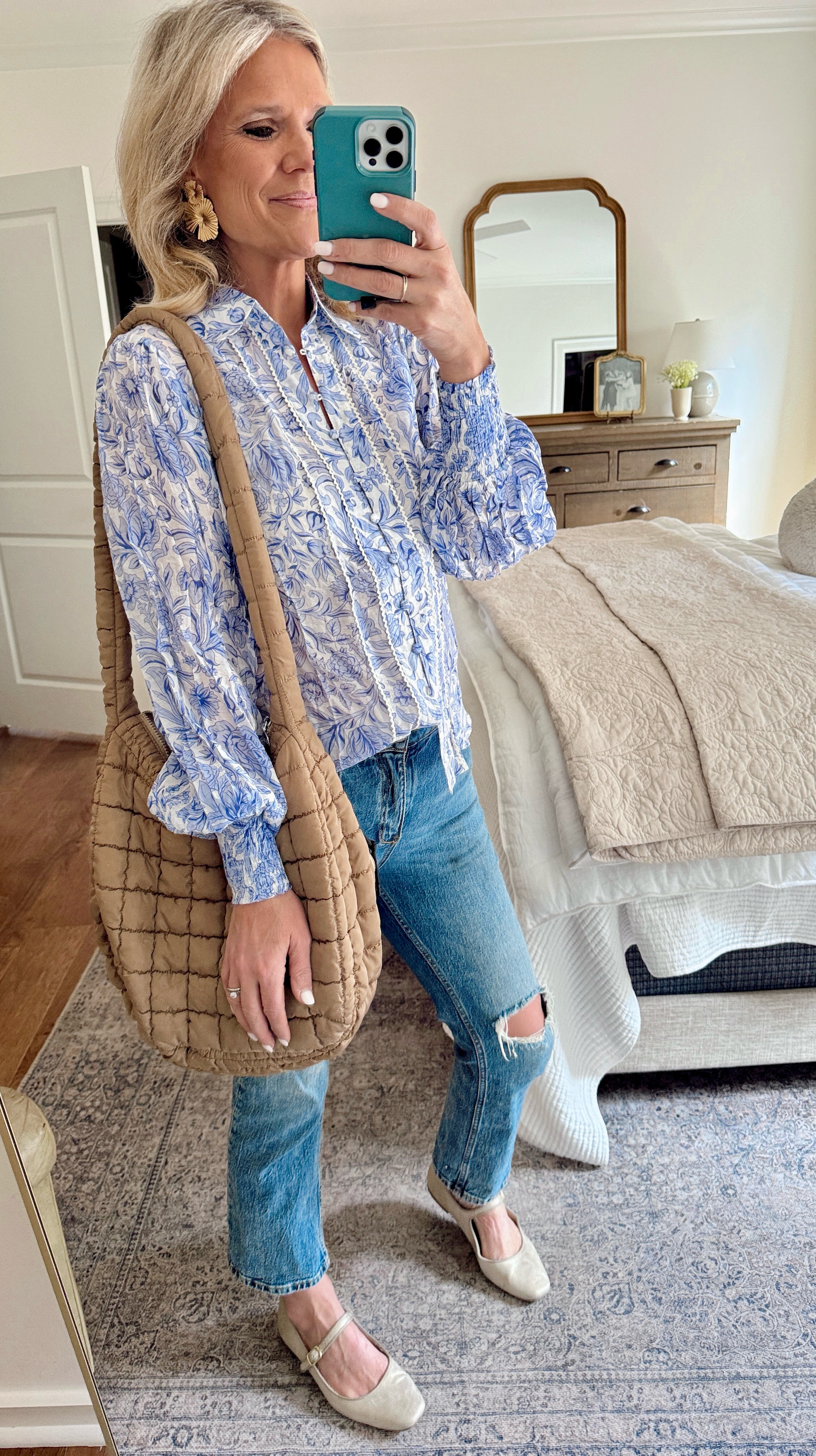 Spring outfit // This top from Petal and Pup is so pretty, pair it with jeans or a skirt. And love this Amazon purse, I wear it with everything! 

#LTKSeasonal #LTKOver40 #LTKWatchNow