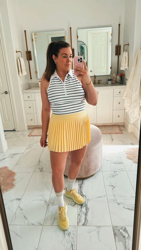 curvy fitness athleisure outfit! top and bottom are 20% off. wearing size xl in striped workout tank (could have taken the large) and size large in yellow pleated workout skort (has shorts underneath!) 

#LTKFitness #LTKActive #LTKMidsize