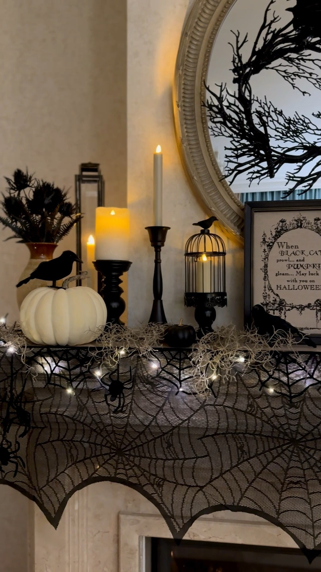 Halloween home decor, Halloween living room mantel decor, black candlesticks, decorative crows, spiderweb mantel scarf

#LTKHome #LTKSeasonal #LTKSaleAlert