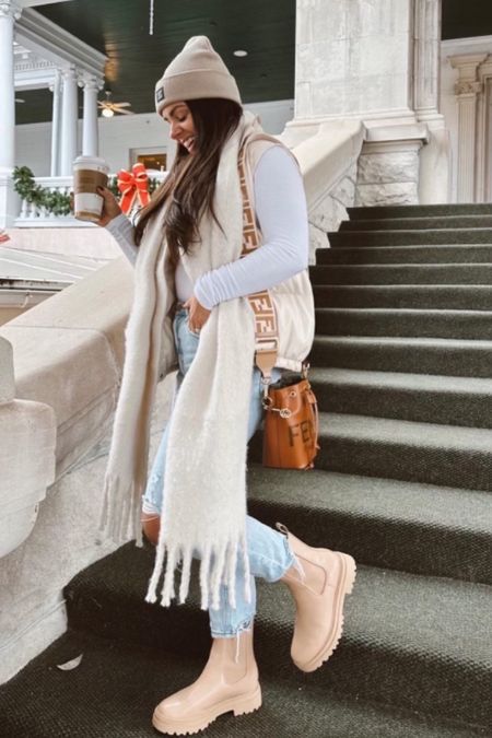 Winter outfit I’m loving 

Abercrombie jeans 
Beige boots 
White scarf 
Holiday outfit 
Gift guide 
Gift guide for her 
Gift for her 

#LTKGiftGuide #LTKstyletip #LTKHoliday