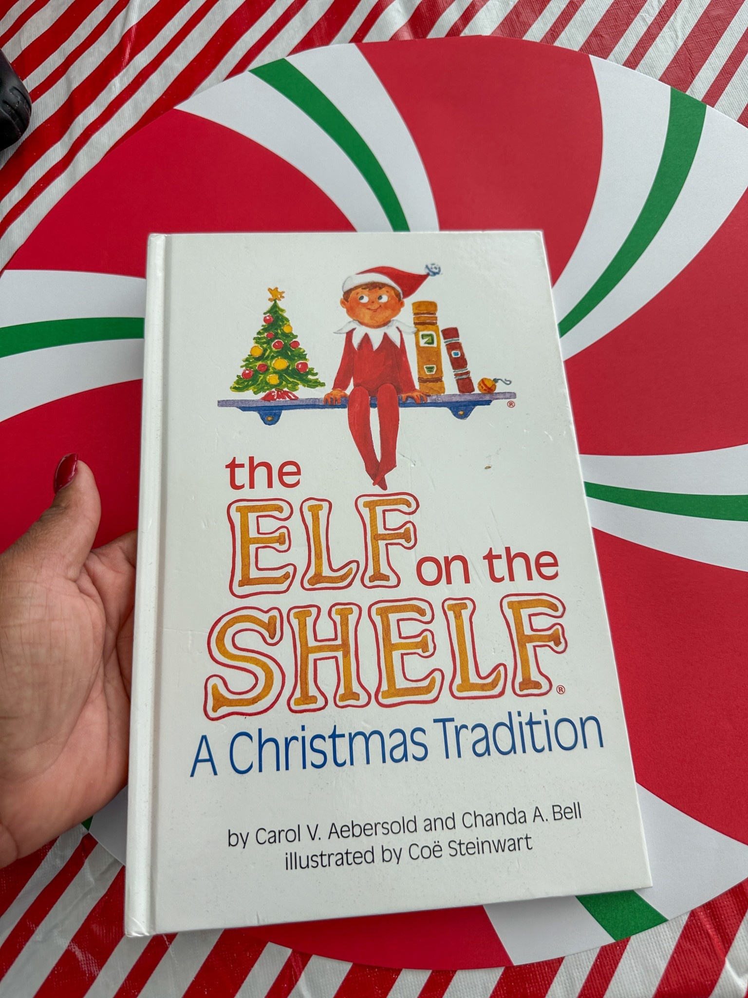 Holiday table decor. Elf on the shelf book. #holidays #holidaydecor #christmas 

#LTKSeasonal