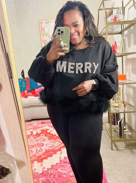 Cropped black sweatshirt with MERRY in rhinestones and fur trim 🤍 

#LTKHoliday #LTKstyletip #LTKbeauty
