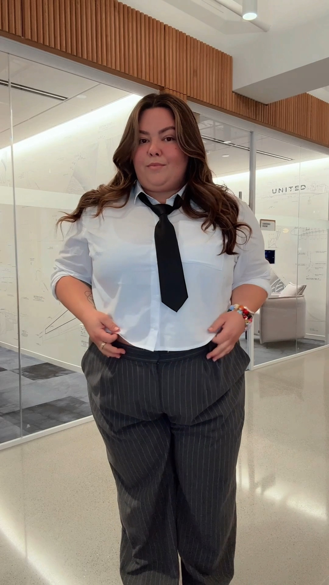 plus size work outfit for the office. I recently wore this to my 9-to-5 corporate marketing job. 
• white button down: Torrid size 3 
• tie: H&M 
• low rise work slacks: Abercrombie size 26 short 
• sneakers: Converse 

#LTKMidsize #LTKPlusSize #LTKWorkwear