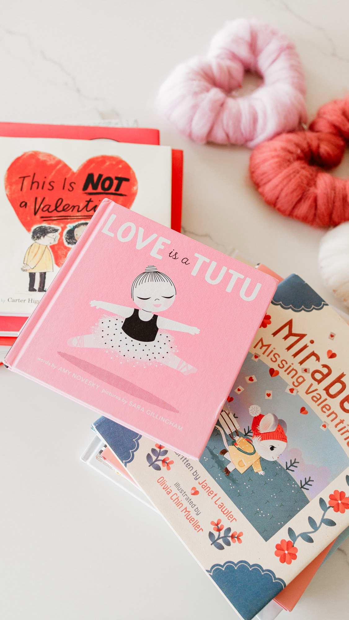 Some of our favorite Valentine’s Day-themed books (plus a couple extra ls that aren’t necessarily valentines-themed, but look super cute on the shelf with the others) 