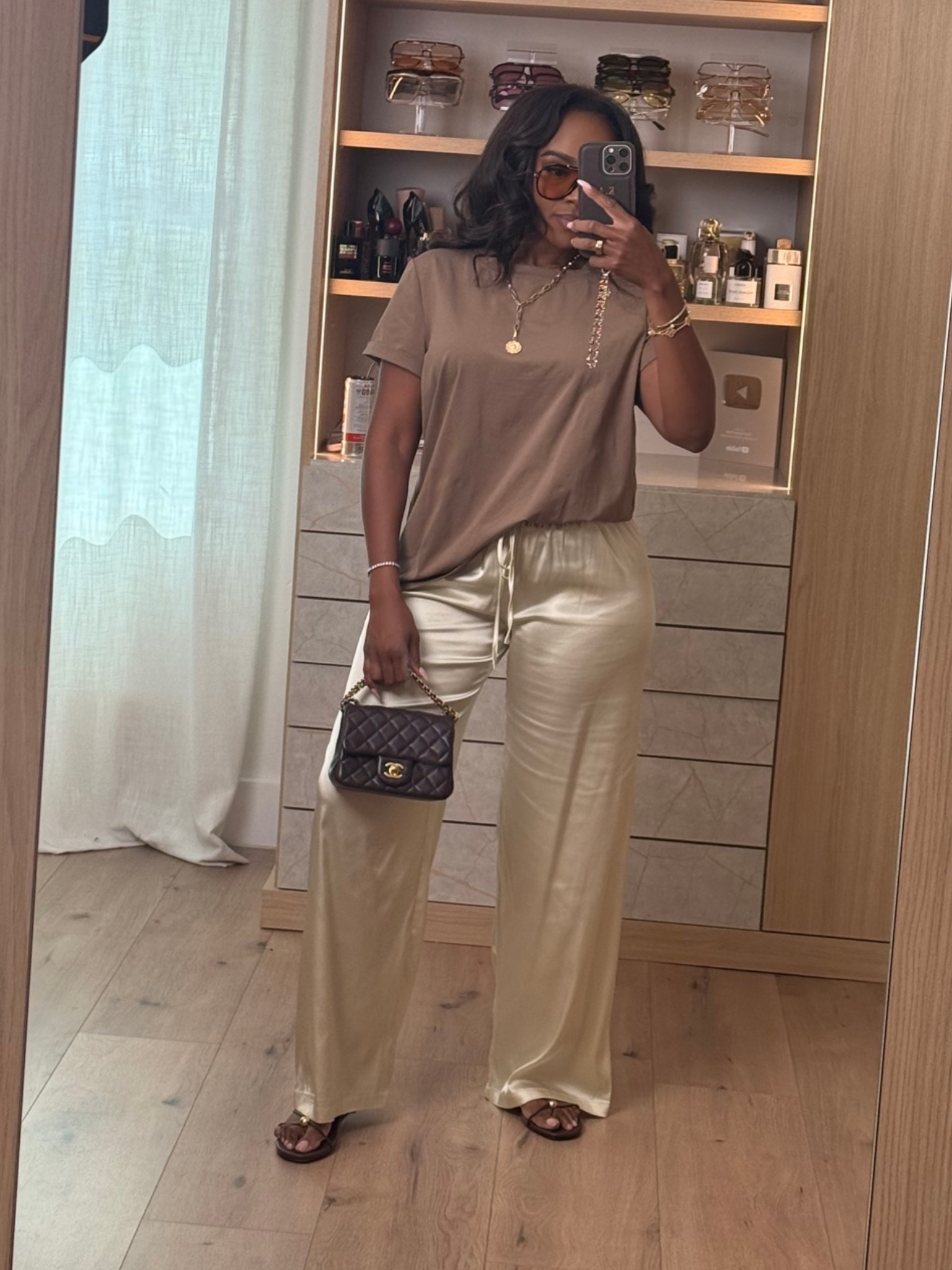 Scroll to shop this effortless neutral look 🤎

This outfit is the perfect mix of comfy and elevated — the relaxed neutral tee paired with silky wide-leg pants gives that effortless luxe vibe while still feeling easy enough for everyday wear. These are the kind of staples you’ll keep restyling over and over again, making the cost per wear so worth it.

Perfect for brunch, travel days, casual dinners, errands, and everyday elevated looks.

📏 Measurements: 5’4”, 140 lbs, 34D bust, 27” waist, 40” hips

Follow me on Instagram and YouTube @kirasfashionfinds

#LTKootd #LTKgrwm #LTKPetite