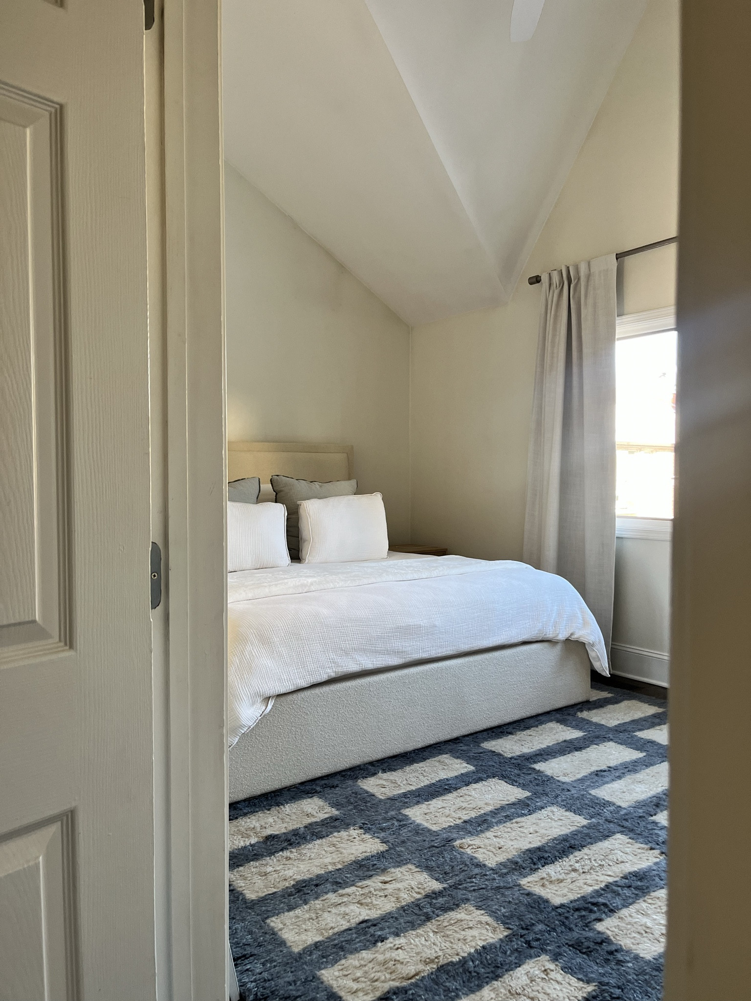 Say hello to our light, bright, cozy primary bedroom. Maximized our long and narrow Chicago townhome master with nightstands with deep drawers and an upholstered storage bed. My husband needs a place for his clothes after all, not me taking over the entire master closet… 😂 You will love how luxurious the rug feels under your feet. Neutral, coastal, yet approachable and homey 🩵

#LTKGiftGuide #LTKMostLoved #LTKhome