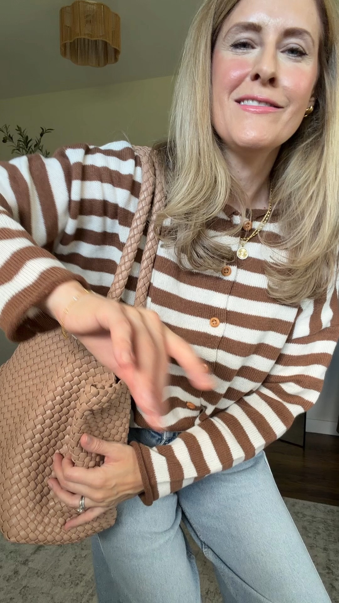 Cute brown and white stripe cardigan c/o @VICI easy to wear as a top or layered, with jeans or a dark pant for work. I’m in a medium. #ad

#LTKOver40 #LTKootd #LTKmomlife
