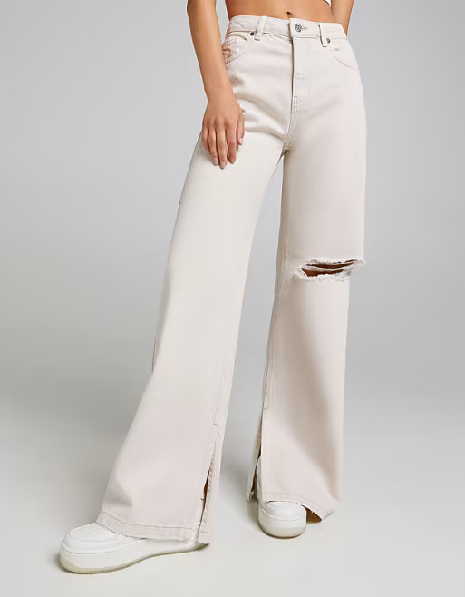Bershka wide leg pants with knee rip in beige | ASOS (Global)