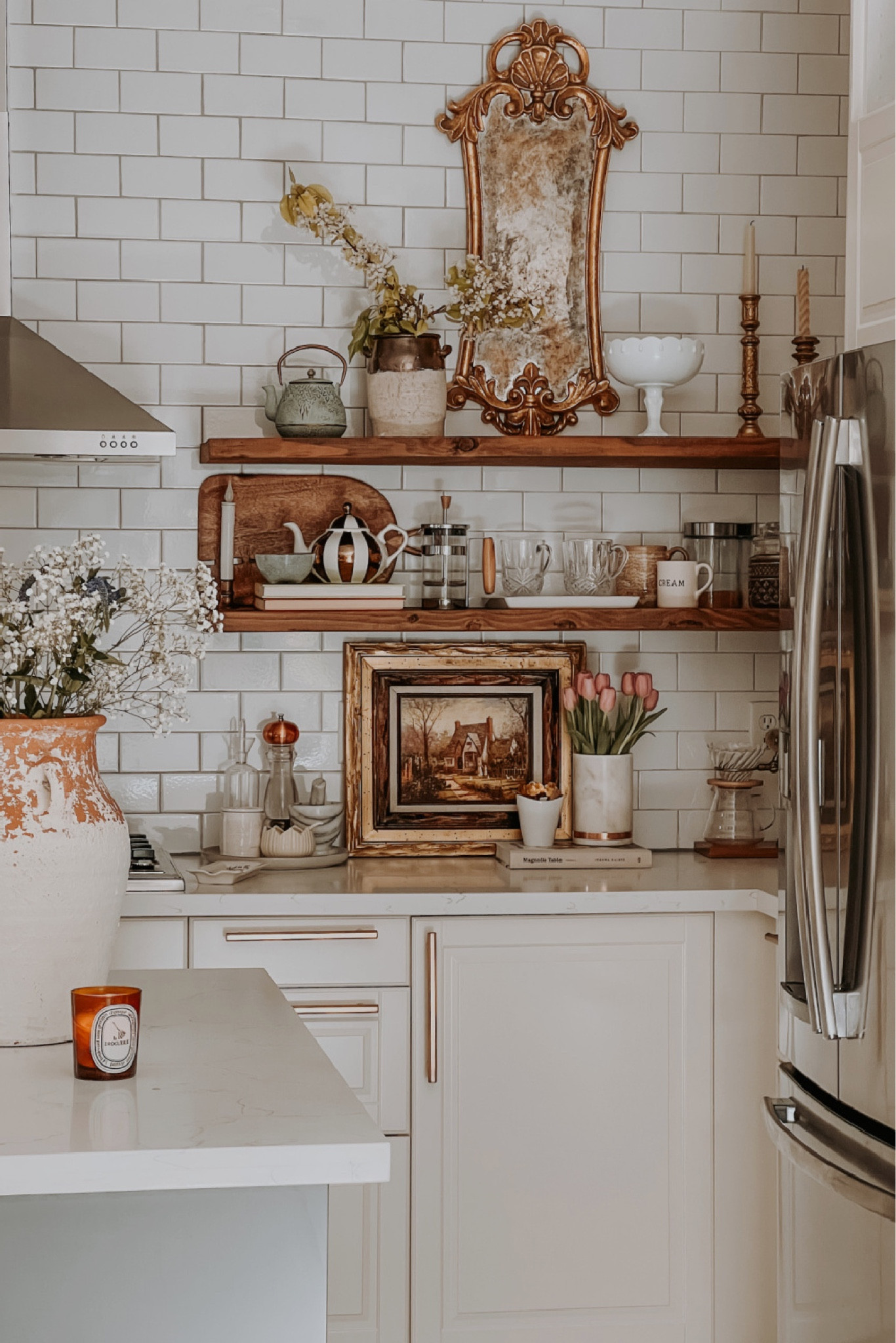 It’s no secret that mirrors can spread natural light and create the illusion of space in a room. However, their versatility for me goes even beyond that, especially a good antique glass mirror for the instant glamor that they add. This one that I antiqued has elevated this area of my kitchen like a fine piece of jewelry does for a simple outfit.  DIY how-to link in the bio. #antiquemirrordiy #mirrordiy #easydiyhowto #easydiy 

#LTKhome #LTKunder100 #LTKstyletip
