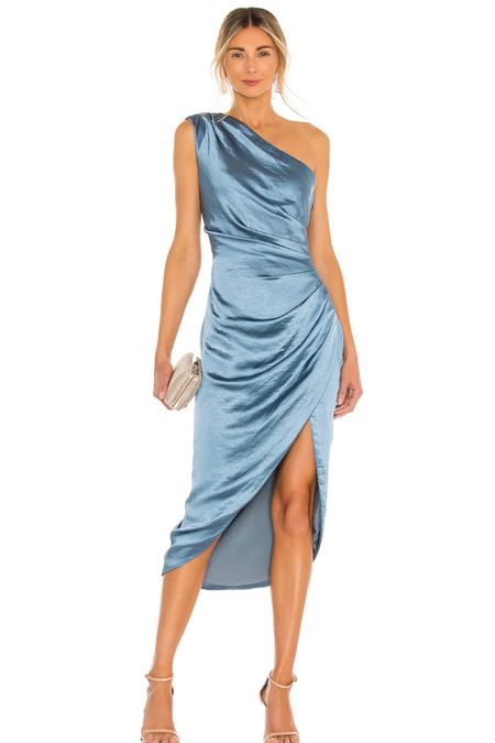 This one shoulder blue dress is perfect to wear to the next wedding you attend as a guest!