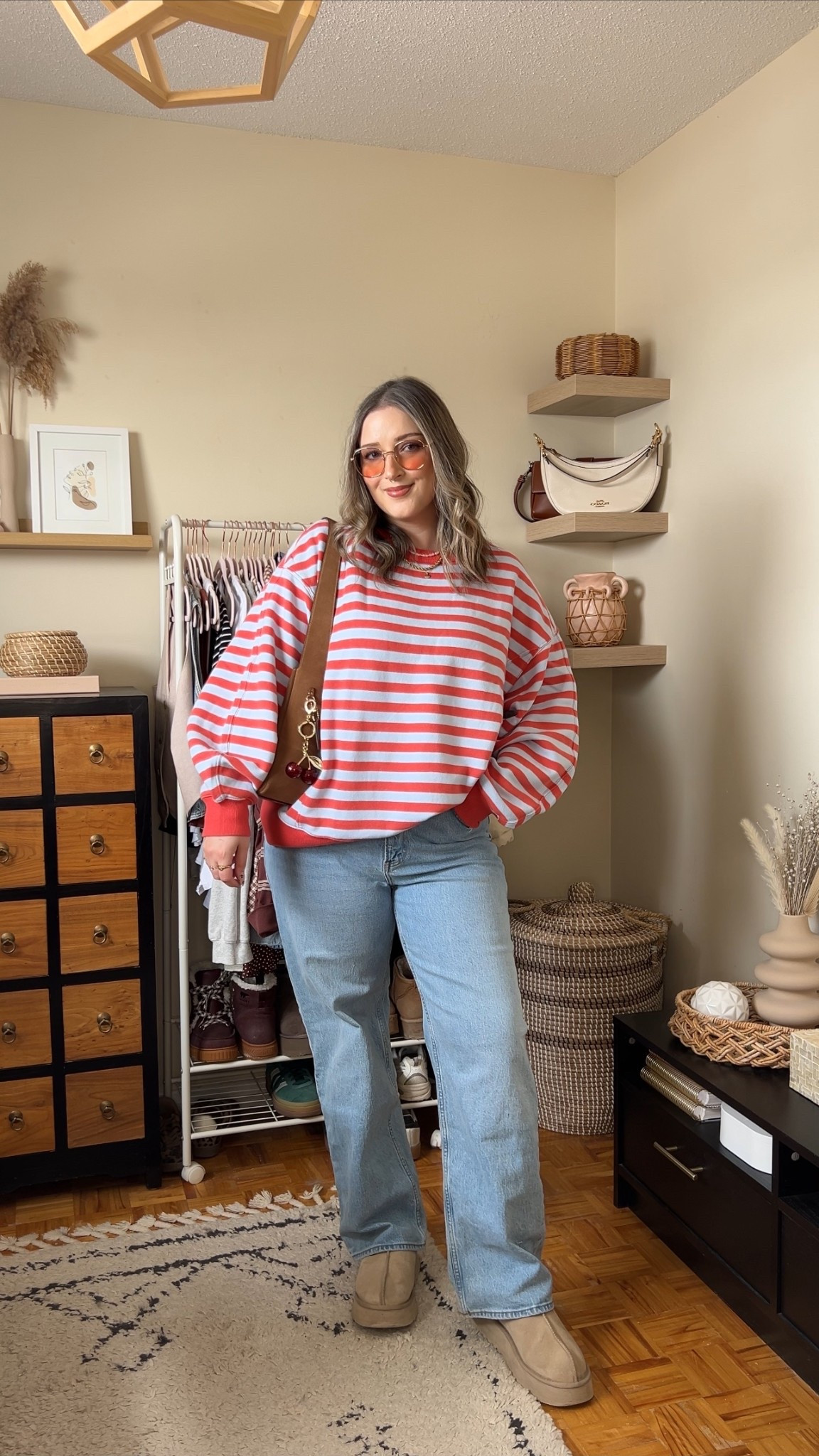 Simple & fun spring outfit! Striped sweatshirt is so cozy and I love the peach & baby blue color combo! Runs big, sized down to M. Wearing my usual 32 in the jeans. I’m a 9.5-10 shoe and wear a 10 in the Ugg tazz platforms

#LTKjeans #LTKsale #LTKstyletip