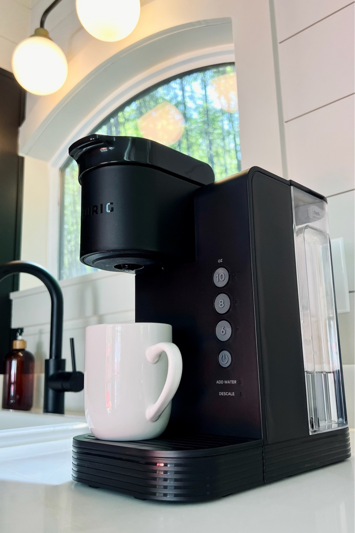 We are on the tail end of renovating a tiny house that my family has on some land near where we live. I have all sorts of plans for this little house, and they all involve hospitality. Nothing is more hospitable than offering a guest a beverage or making coffee readily available for overnight guests, which is why I love the ease and convenience of a Keurig coffee machine. If I’m at the tiny house all by myself, I don’t have to bother with making a full pot of coffee for just me, and when I have multiple guests for the day or overnight, everyone gets to customize their own drink to their preference. I love the sleek design of this black one that I bought!

#tinyhouse #coffee #coffeemachine #keurig

#LTKhome #LTKmens #LTKfamily