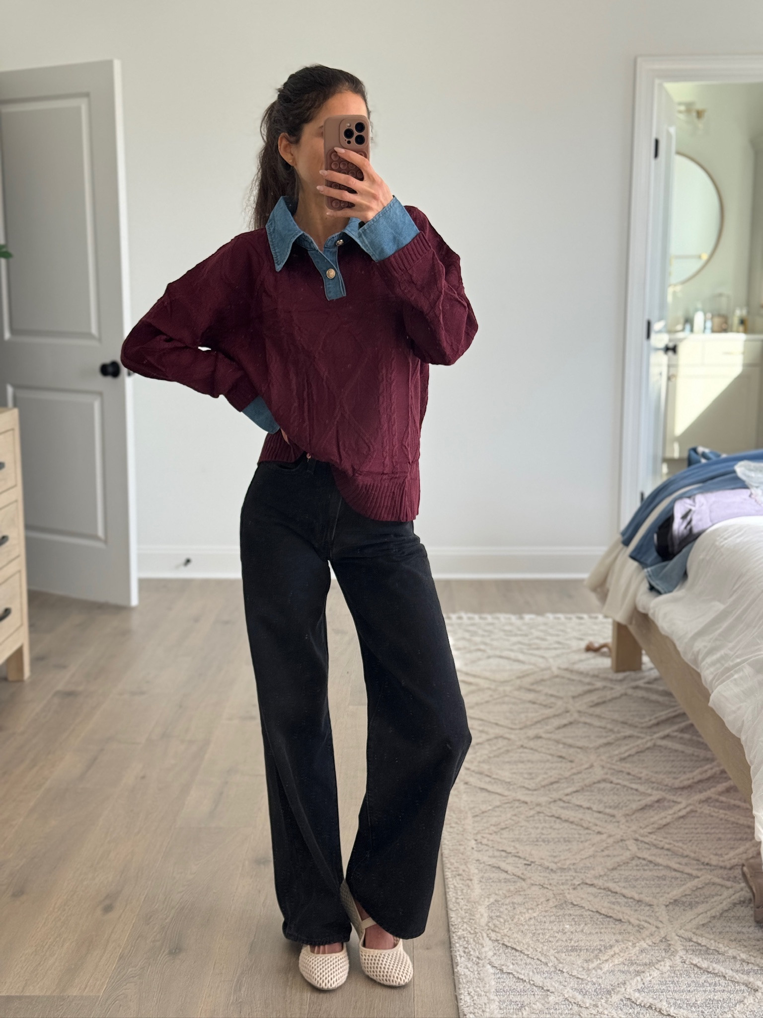 Layered outfit inspiration with a sweater over a denim collared shirt and black wide leg jeans. Casual fall outfit, winter layering ideas, neutral everyday outfit, classic style staples, relaxed fit sweater, wide leg denim, easy mom outfit, simple capsule wardrobe, timeless casual fashion.

#LTKFindsUnder50 #LTKSeasonal #LTKWorkwear