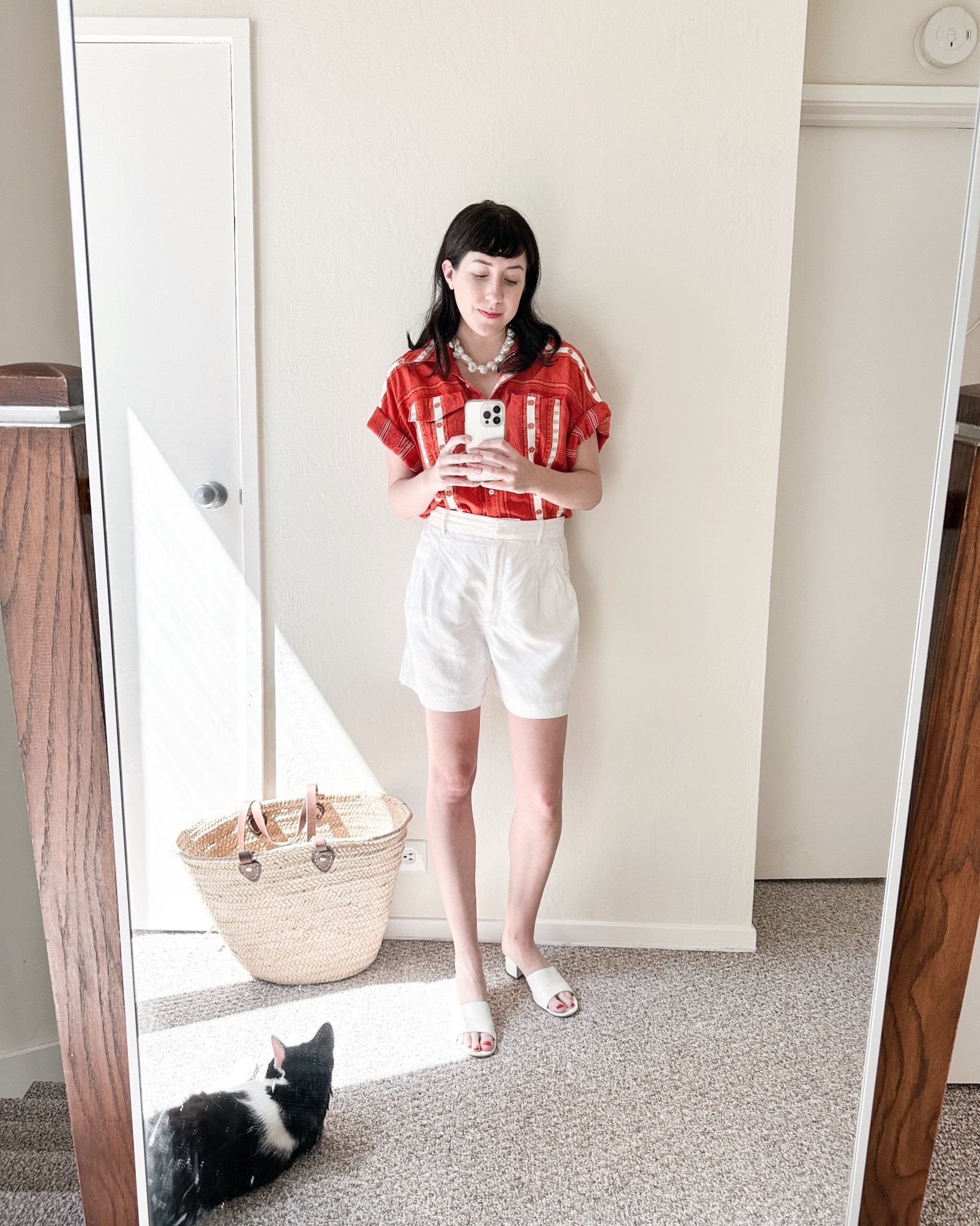 I love wearing a tropical shirt with a pair of easy trousers shorts and simple accessories like this Etsy shell necklace and Maryam Nassir Zadeh sandals. Linked some similar options too!
