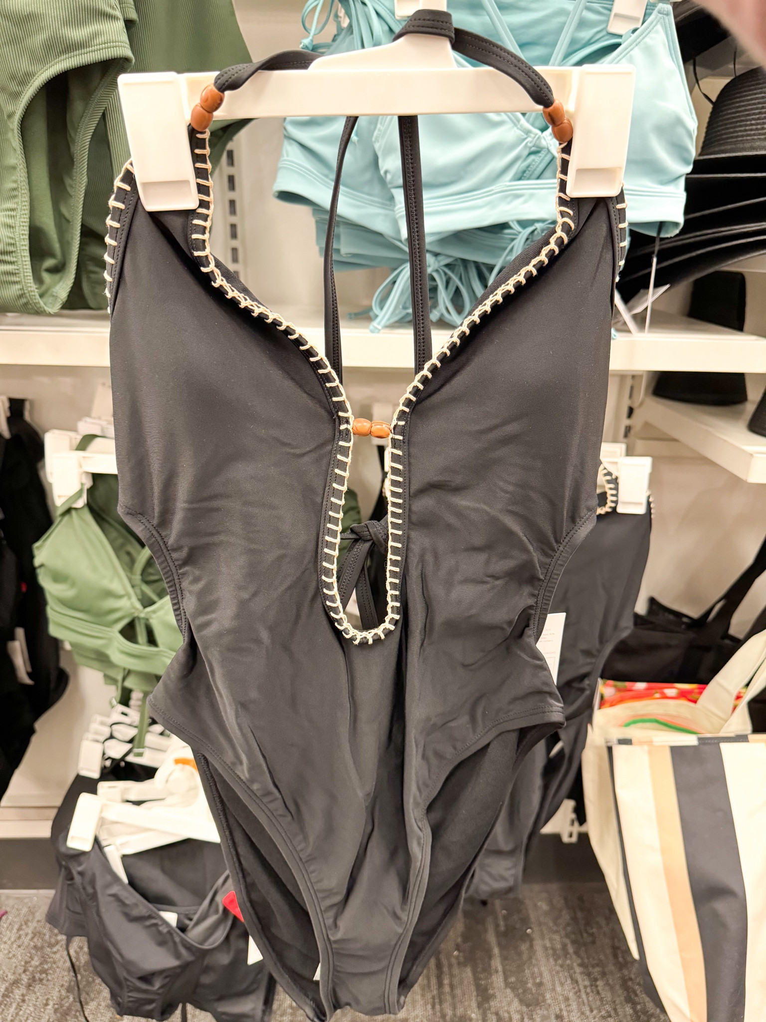 from the target app:

Add statement style to your swimwear wardrobe with this Plunge Bead Detail Extra High Leg One Piece Swimsuit from Shade & Shore™. This plunge-front one-piece swimsuit is made from stretchy fabric for ease of movement and bead detail on the straps for added flair. Tailored in a cheeky, extra-high-leg silhouette, this suit offers chic style. Plus, the removable cups offer customizable coverage, and the crisscross straps and back tie closure make it easy to find just the right fit.

#LTKstyletip #LTKfindsunder50 #LTKswim