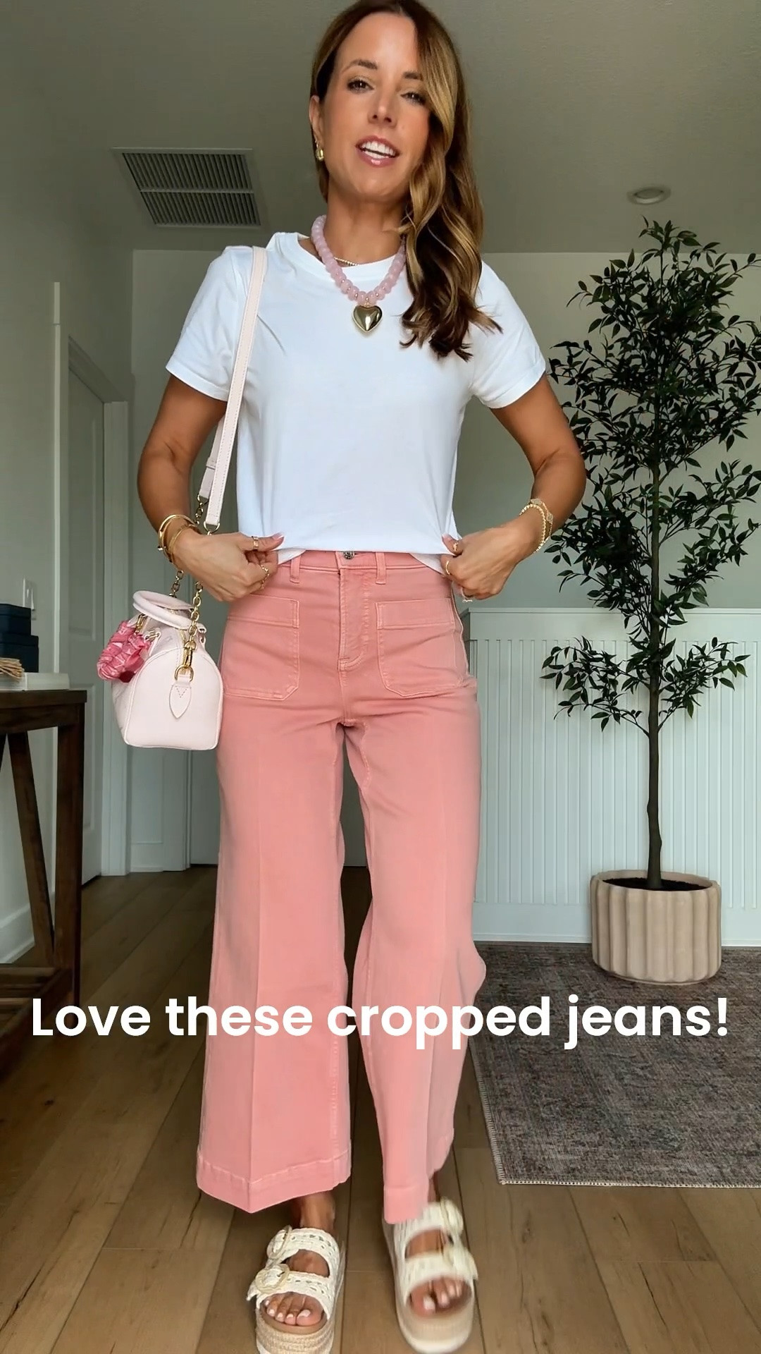 My spring outfit of the day. Summer outfit. Elevated casual. Mom outfit. I love this Spanx wide leg latch pocket jeans! Medium compression. Code LISAMARIEXSPANX on first time orders. Wearing XS petite. Could size down if in-between sizes. XS in cotton t-shirt. Beaded heart necklace. Target buckle slide sandals.

#LTKootd #LTKgrwm #LTKPetite