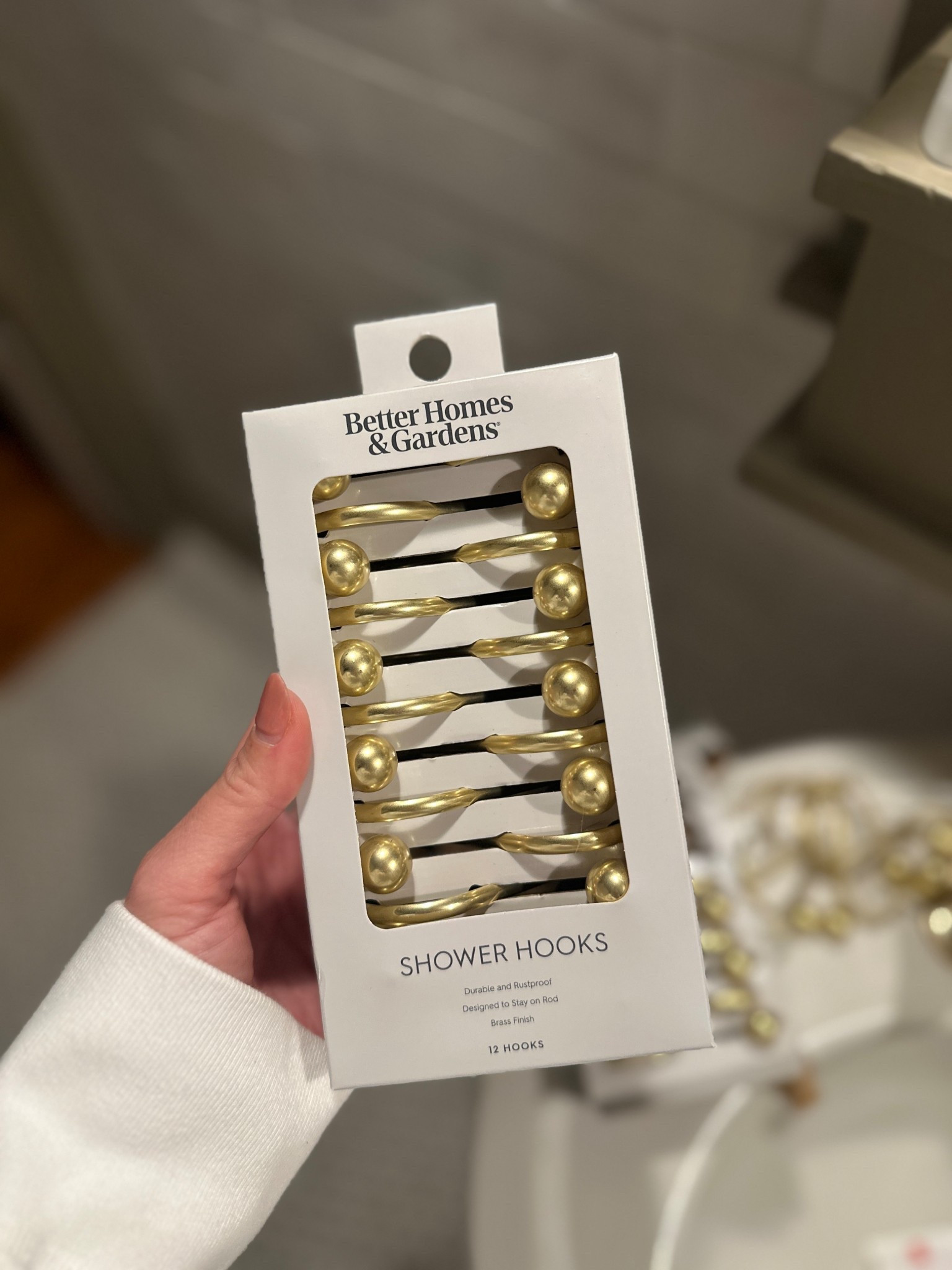 I loved these shower curtain clips from Walmart for their simple design and bright brass. They look far more expensive than $11