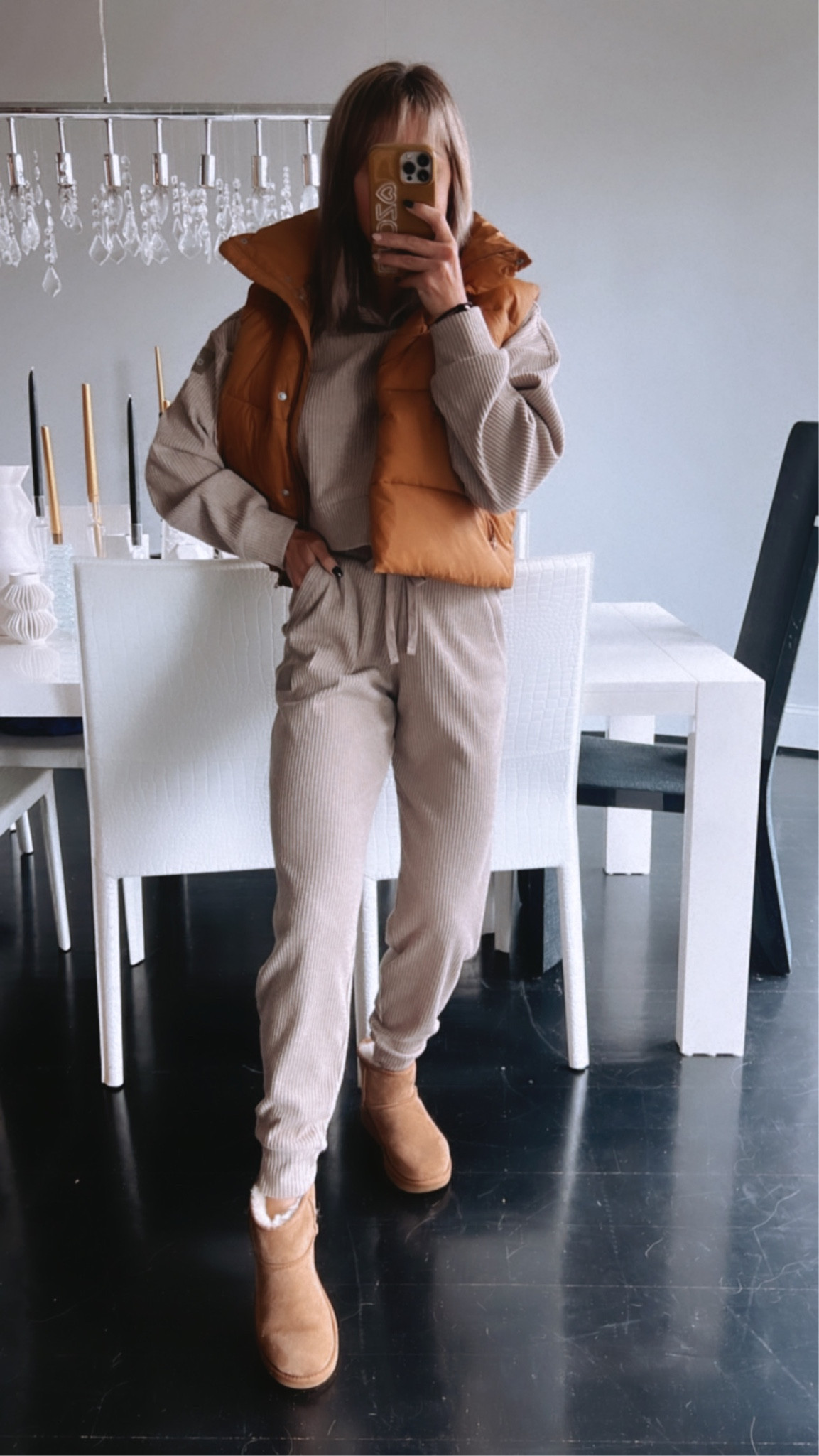 Cozy vibes with my puff let vest, matching set, and mini Uggs. Wearing a size small in the vest and cropped hoodie. Wearing an XS in the joggers and a size 6 in the Ugg boots  

#LTKfit #LTKunder100 #LTKSeasonal