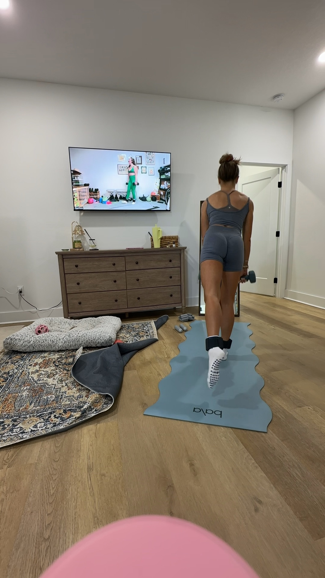 @ptula00 size XS workout set. The BAREPRO Sculpt Short is made to flatter you from any angle, thanks to built-in glute-sculpting technology, high rise defining waistband and our iconic V-contour stitching that work together to lift and shape. Crafted from our lightweight and breathable BAREPRO fabric, these shorts offer a marled finish that conceals imperfections for a smooth appearance. You'll feel confident and comfortable all day long. Drop it low - without compromising comfort or style. The Drop It Low Tank is made with a modest length that stays in place, adjustable straps for a just-right fit, and a silhouette that flatters without feeling clingy. It’s the kind of easy, wear-it-anywhere tank that makes getting dressed feel like no big deal - in the best way.

My workout and workout gear for my daily workout. I take pilates classes from @lexfish on Instagram she has a whole online platform and membership! Most of my pilates gear and tools are from Bala. Bala use code SLOANE15. 
#workoutgear #workoutwear #pilates #ootd #outfit #athleticwear #athleticoutfit #bikershorts #sportsbra #pilatesoutfit #athleisure #bala #pilatesworkout #pilateslovers #pilatestiktok #balabangles

#LTKmorningroutine #LTKActive #LTKfitnessgoals