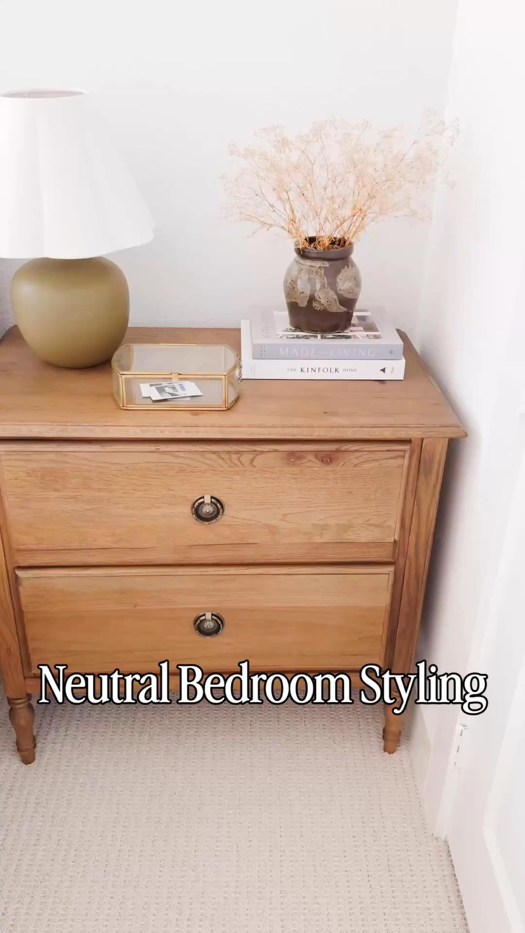 Simple neutral bedroom styling that feels elevated but still effortless 🤍 This wood nightstand styled with a ceramic lamp, stacked books, and a textured vase is the easiest way to create a cozy, designer look for less. If you love minimal, organic modern decor and calming bedroom ideas, this is such a simple refresh you can recreate. Follow me on LTK for daily home decor, Amazon finds, and neutral styling ideas.

#LTKHome #LTKSaleAlert #LTKvlog
