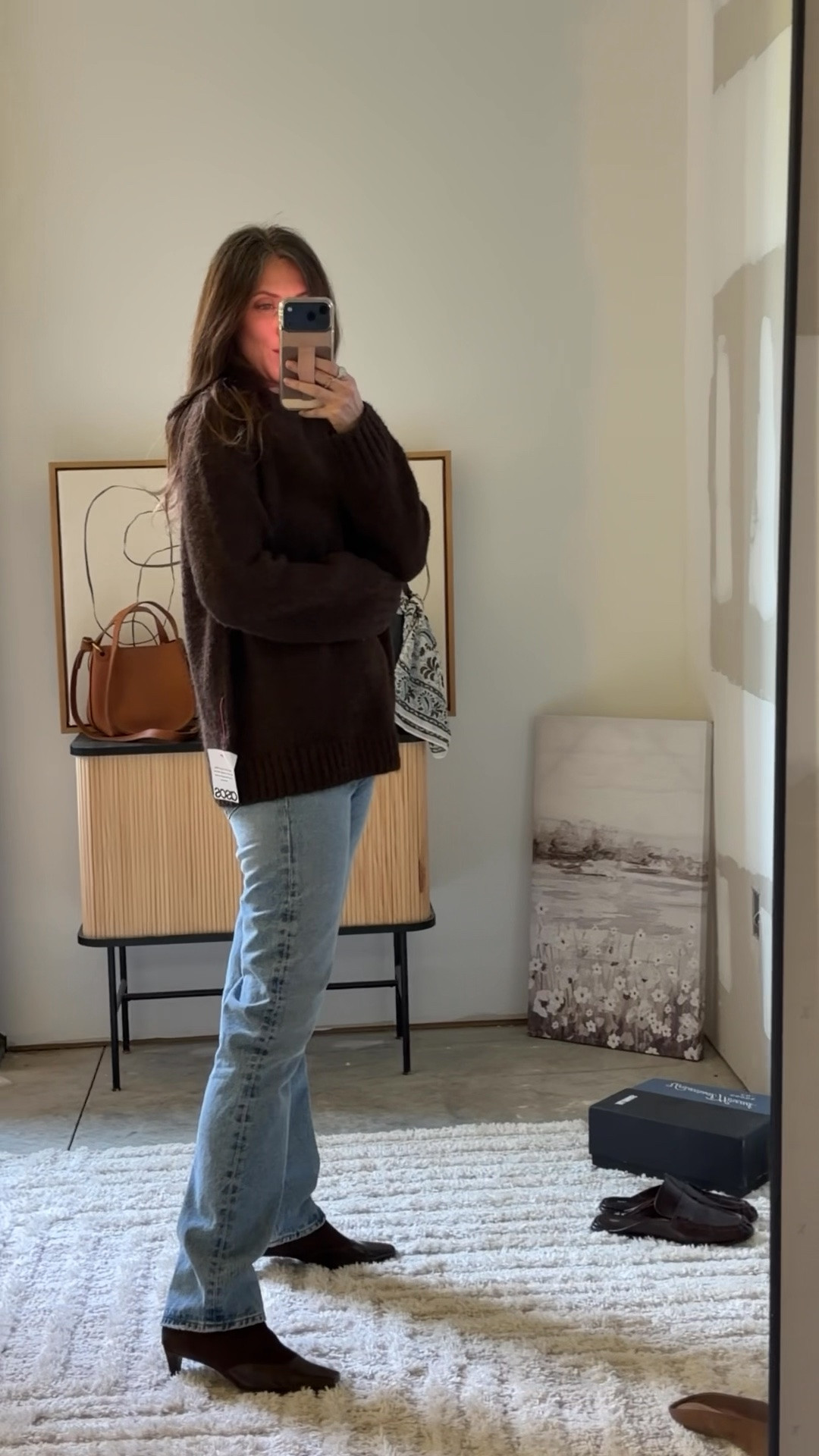 Wearing the small @ASOS sweater and 27” tall jeans from @Revolve. The @Walmart boots fit true to size and are very comfy

#LTKootd #LTKSaleAlert #LTKOver40