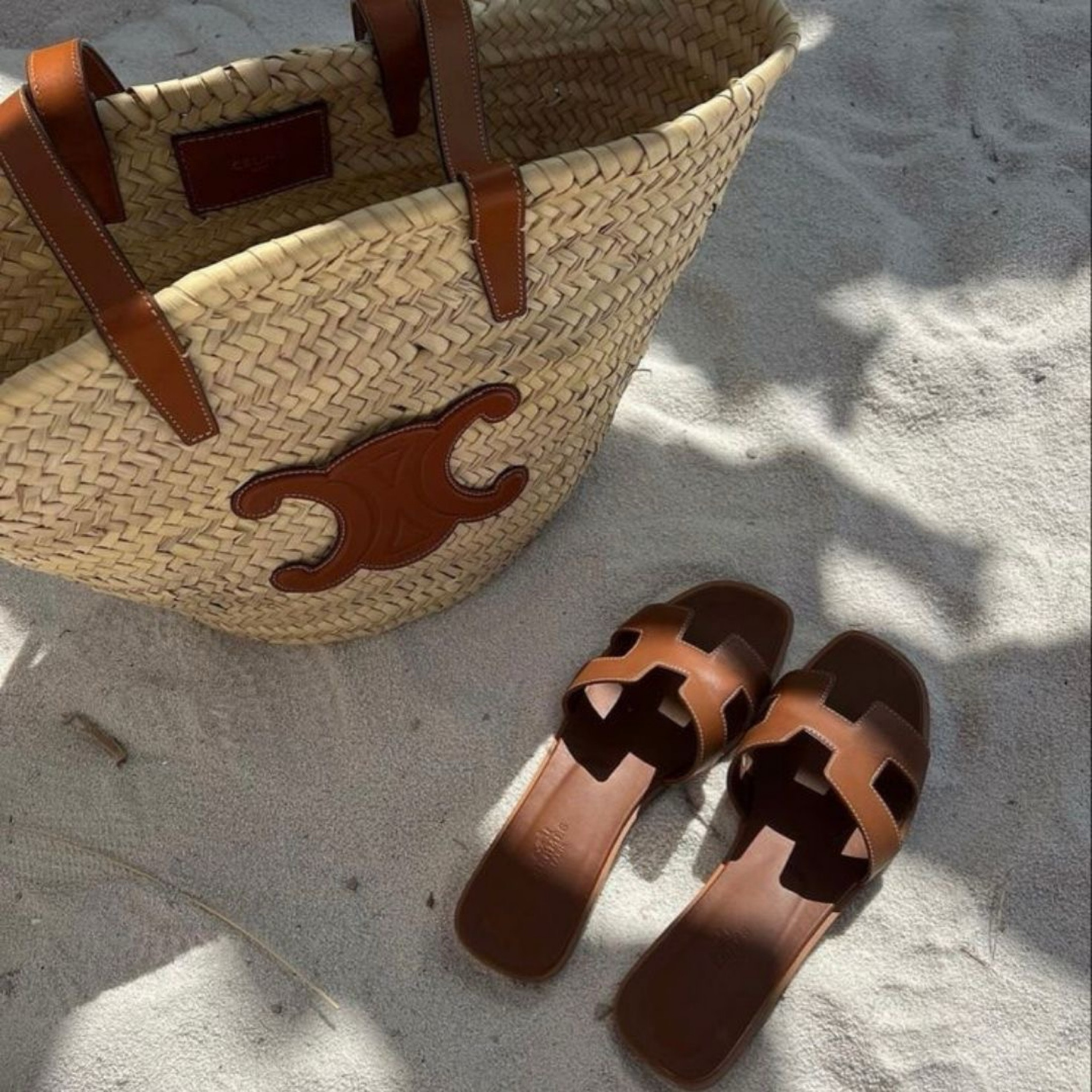 Elevate your beach day style with this chic woven bag, perfectly complemented by these timeless Hermes flats. The perfect duo for effortless elegance and luxury in the sand. 🌴👡 #BeachVibes #EffortlessStyle #LuxuryEssentials

#LTKItBag #LTKStyleTip #LTKSwim