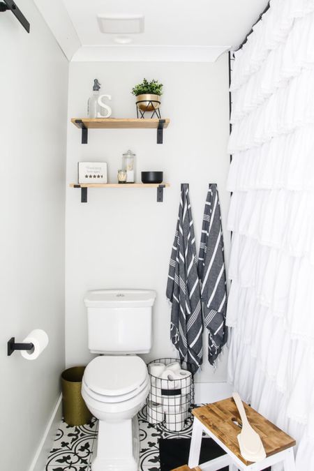 Search white subway tile today on the blog for all the inspo! When figuring out your bathroom design it’s good to go with something sleek, easy to clean, and classic. A lot of this could definitely apply to guest bathroom decor, including the ruffled bathroom shower curtain, shower curtain hooks, and shower shelves. 

#LTKsalealert #LTKstyletip #LTKhome
