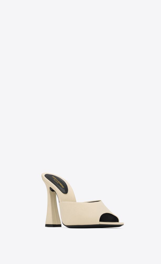 mules with an almond peep toe and covered flared heel. | Saint Laurent Inc. (Global)